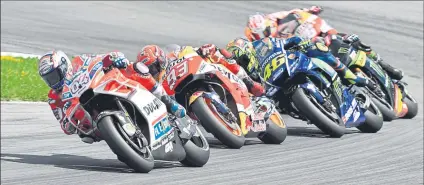  ?? FOTO: AP ?? Andrea Doviziozo fue un líder muy sólido en carrera y supo gestionar mejor los neumáticos blandos que su compañero Jorge Lorenzo