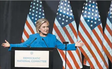  ?? JIM MONE/AP ?? Hillary Rodham Clinton addresses the summer meeting of the Democratic National Committee on Friday in Minneapoli­s.
