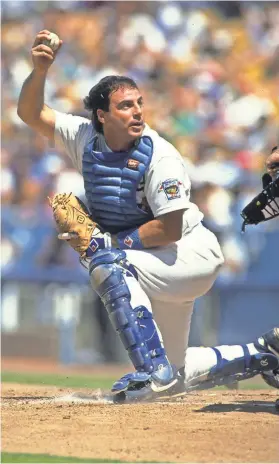  ?? 1992 PHOTO BY STEPHEN DUNN, GETTY IMAGES ?? In a 13-year playing career with the Dodgers, Mike Scioscia hit .259, was a two-time All-Star and won two World Series titles.