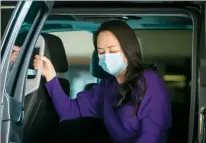  ?? CP PHOTO DARRYL DYCK ?? Meng Wanzhou, chief financial officer of Huawei, wears a face mask to curb the spread of COVID-19 as she arrives at B.C. Supreme Court to attend a hearing in Vancouver, on Sept.29.