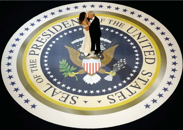 ?? — AP file ?? President Donald Trump dances with first lady Melania Trump at The Salute To Our Armed Services Inaugural Ball in Washington.