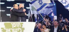  ?? (Marc Israel Sellem/The Jerusalem Post) ?? BENNY GANTZ and Moshe Ya’alon hug at an event in Tel Aviv on January 29.