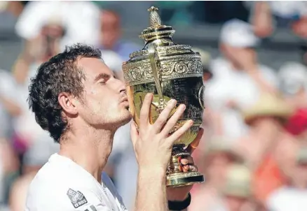  ?? Wait is over: Andy Murray celebrates after he defeated Novak Djokovic in their men’s singles final clash at Wimbledon. ??