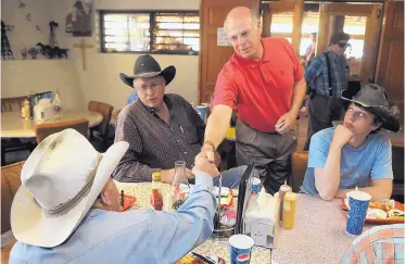  ?? GREG SORBER/JOURNAL ?? Steve Pearce shakes hands with Joe Smith of Capitan between Bill Wrye, left, and Tyler Cullison of Estancia at The Old Mill restaurant in Estancia in 2008 when Pearce was running for the U.S. Senate.