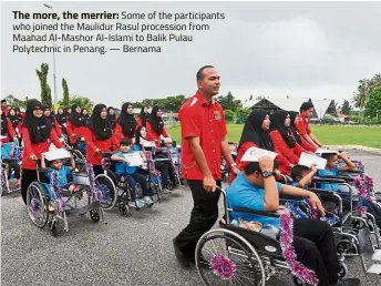  ??  ?? The more, the merrier: Some of the participan­ts who joined the Maulidur Rasul procession from Maahad Al-Mashor Al-Islami to Balik Pulau Polytechni­c in Penang. — Bernama