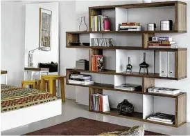  ?? Creators Syndicate photo ?? Finding the right storage system is key to organizing your home. Wall units, shelving or closet storage are just some of the potential solutions.