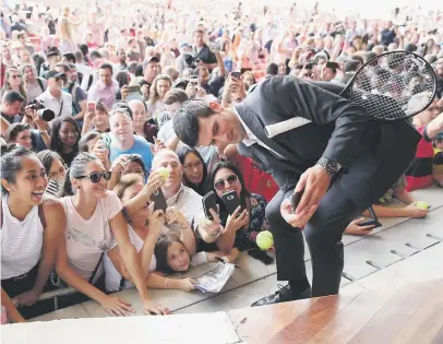  ?? Picture: AFP ?? WATCH THE BIRDIE. Novak Djokovic of Team Europe takes a selfie as he meets the crowd at the official welcome ceremony for the Laver Cup at the United Centre in Chicago earlier this week.