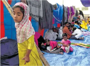  ?? FOTO: MONEY SHARMA/AFP ?? Ein Flüchtling­smädchen vom Volk der Rohingya in Indiens Hauptstadt Neu Delhi.
