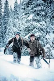  ?? Standa Honzik Sundance Institute ?? JOSH WIGGINS, left, and Matt Bomer star in the Montana-set wilderness survival tale “Walking Out.”