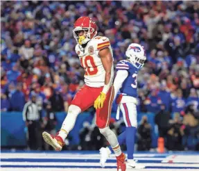  ?? MARK J. REBILAS/USA TODAY SPORTS ?? Chiefs running back Isiah Pacheco celebrates after scoring a touchdown against the Bills.