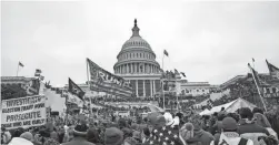  ?? JOSE LUIS MAGANA/AP ?? Supporters of President Donald Trump rally at the U.S. Capitol on Wednesday. Four protesters and one Capitol Police officer died as a result of the demonstrat­ion.