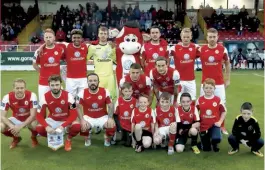  ??  ?? Top Benny the Bull joins Sligo’s pre-match photo Below right The Bairns’ faithful drank Mooney’s dry pre- and post-match Far right Rovers’ ultras stand their ground after failing to hoist their flag Below Sligo midfielder Daniel Kearns fends off...