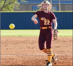  ?? The Sentinel-Record/Grace Brown ?? STATE BOUND: Lake Hamilton junior Charlye Rowland (22) throws a pitch during 17-0 road win at Lakeside on April 9. The Lady Wolves will start out in the Class 6A state tournament on Thursday at 10 a.m. against Pine Bluff in Greenwood.