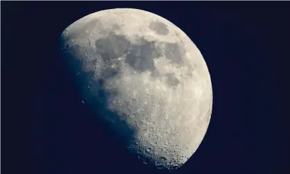  ?? Photograph: Laurent Emmanuel/AFP/Getty ?? A view of the moon from Cannes, southern France, in May 2019. ‘Water is a very expensive commodity in space,’ says one expert.