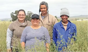  ?? Photos: Glenneis Kriel ?? OPPOSITE PAGE: Alfreda Mars is increasing the production potential of her sheep to reduce risks associated with wheat production.ABOVE: Alfreda Mars (front) with (from left) her daughter, Falon-Lee, and workers, Richard Christians and Jan Meyer.