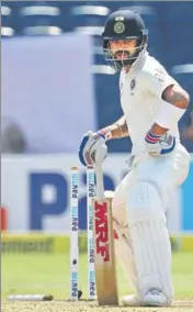  ?? GETTY ?? Virat Kohli lost his offstump after he shouldered arms to a straighter Steve O’Keefe delivery.