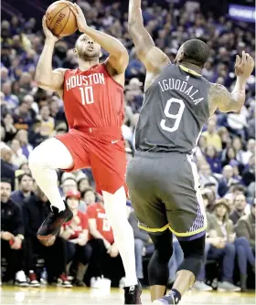  ?? AP FOTO ?? STRONG START. Eric Gordon and the Houston Rockets opend with a 15-0 run against Golden State.