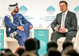  ?? — Photo by Dhes Handumon and Shihab ?? Elon Musk and Mohammed Al Gergawi, Minister of UAE Cabinet Affairs and the Future, at a discussion at the summit.