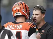  ?? STEPHEN BRASHEAR — THE ASSOCIATED PRESS ?? Cincinnati’s Andy Dalton threw for 418yards and two TDs in new head coach Zac Taylor’s offense against Seattle.