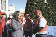  ?? Lea Suzuki / The Chronicle ?? Mayor London Breed, with Union Square ambassador Michael Chaney, vows to clean the streets.