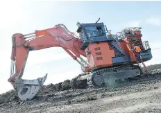  ?? DON HEALY ?? Daniel Berube runs a Hitachi 1900 excavator at the Borrow Pit area of the Regina bypass project northwest of Regina. The Ministry of Highways and Infrastruc­ture and Regina Bypass Partners hosted a tour to allow media to see the work as it progresses.