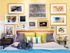  ?? BILL O’LEARY/WASHINGTON POST ?? The art-filled bedroom of Chris and Beverly With.