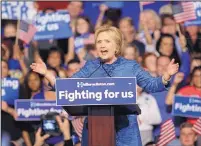  ?? LYNNE SLADKY/ASSOCIATED PRESS ?? Hillary Clinton’s well-oiled political machine is planning on spending at least $41 million on anti-Trump commercial­s in crucial states over the next six weeks.