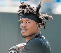  ?? MIKE MCCARN THE ASSOCIATED PRESS FILE PHOTO ?? Quarterbac­k Cam Newton has a list of questions to answer but, if capable of doing so, New England’s acquisitio­n of the former National Football League MVP could look like a stroke of genius.