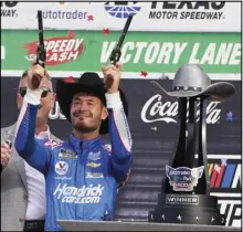  ?? Associated Press ?? Kyle Larson (5) celebrates after winning a NASCAR Cup Series auto race at Texas Motor Speedway on Oct. 17 in Fort Worth, Texas.