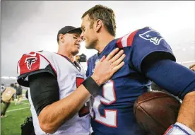  ?? MADDIE MEYER / GETTY IMAGES ?? The Patriots and quarterbac­k Tom Brady (right) got the best of the Falcons and quarterbac­k Matt Ryan again Sunday night.