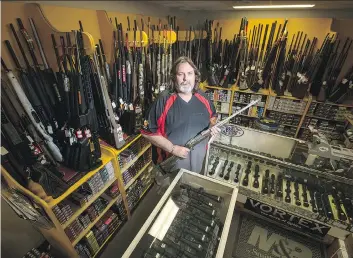  ?? LIAM RICHARDS ?? Michael Kincade of North Pro Sports says new rules on engraving firearms with either ‘Canada’ or ‘CA’ will be passed on to buyers. Some estimates indicate the cost increase could be as much as $200.