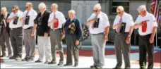  ?? DISPATCH STAFF PHOTO ?? WAVEM members bow their heads in a moment of silence for fellow members who have died during the pass year during a Memorial Day Service in Wampsville. Photo taken on Friday, May 30, 2014.