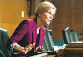  ?? Chip Somodevill­a Getty Images ?? ELIZABETH WARREN showed in a 2014 confirmati­on battle that she was willing to take personal shots at her targets and go against her own party’s leaders.