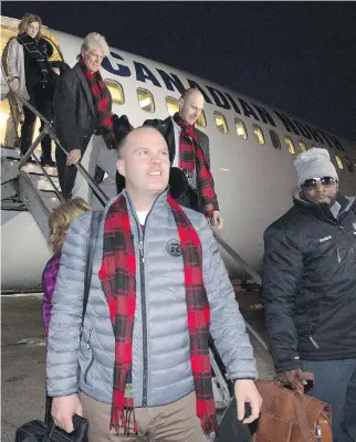  ?? JONATHAN HAYWARD/THE CANADIAN PRESS ?? Ottawa Redblacks head coach Rick Campbell arrives in Winnipeg on Tuesday. The Redblacks will have a curfew this week amid the festivitie­s going on during Grey Cup preparatio­ns.