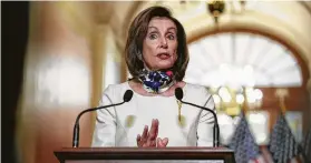  ?? Graeme Jennings / Associated Press ?? House Speaker Nancy Pelosi on Tuesday unveiled a $3 trillion coronaviru­s aid bill that would provide hazard pay for essential workers and more cash to taxpayers.