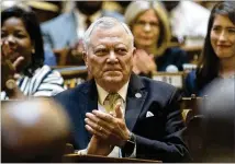  ?? ALYSSA POINTER PHOTOS / ALYSSA.POINTER@AJC.COM ?? Georgia Governor Nathan Deal applauds the recent inductees into the Georgia Supreme Court during a swearing-in ceremony Thursday at the State Capitol in Atlanta.