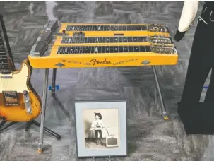  ??  ?? Top: Before Doug Sahm wa a progressiv­e-country artist, he was a country music child prodigy who played steel guitar. The instrument is in the exhibit, along with a Western outfit made for him by his mother. Right: Jody Payne was a guitarist in Willie...