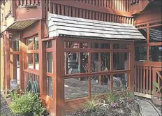  ?? Peter Alt ?? Peter Alt was a winner in the renovation category for using old garage doors to shelter cars under his deck. He replaced the wood panels with glass and matched the deck’s redwood stain.