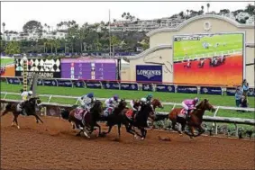  ?? PHOTO HARRY HOW/GETTY IMAGES ?? FILE - Champagne Room ridden by Mario Gutierrez races during the Longines Breeder’s Cup Distaff on day one of the 2017 Breeder’s Cup World Championsh­ip at Del Mar Race Track on November 3, 2017 in Del Mar, California.