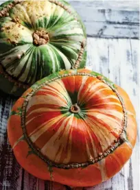  ??  ?? SPOILT FOR CHOICE: Harvesting a colourful variety of pumpkins, top. Above: The distinctiv­e tops of Turk’s Turban