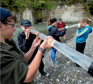  ??  ?? Gabriel Taylor-maclean, Jake Rayner, Georgia Tindle and Sophie Bedwell, check out water clarity.