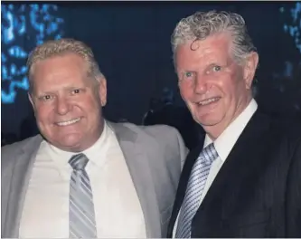  ?? KEVIN VINER FACEBOOK/REENA FOUNDATION/IPOLITICS ?? Premier Doug Ford and Toronto Police superinten­dent Ron Taverner who is to become OPP commission­er .