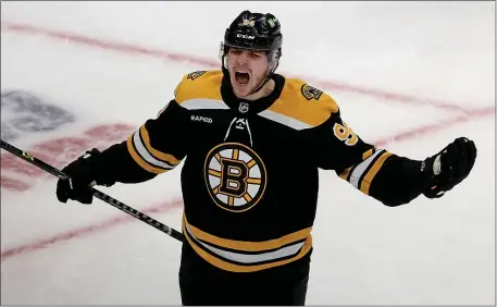  ?? MATT STONE — BOSTON HERALD ?? Boston’s Jakub Lauko screams out in celebratio­n after scoring during the second period of a 7-1 win over the Buffalo Sabres at the TD Garden.