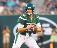  ?? Jim McIsaac / Associated Press ?? New York Jets quarterbac­k Trevor Siemian looks to make a play against the Philadelph­ia Eagles during a preseason game in August.