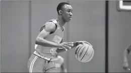  ?? GARY MIDDENDORF/DAILY SOUTHTOWN ?? Homewood-Flossmoor’s Josiah Palmer looks to make a play against Thornton during a game in Harvey on Jan. 14. Palmer scored a game-high 21 points on Friday.