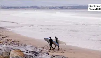  ??  ?? Surfers at Strandhill