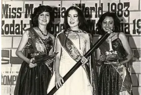  ??  ?? Yeoh (centre) won the Miss Malaysia World title in 1983. — Filepic