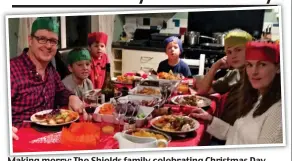  ??  ?? Making merry: The Shields family celebratin­g Christmas Day
