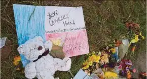  ?? REUTERS PIC ?? A teddy bear is left at a memorial at the site of the shooting at the First Baptist Church of Sutherland Springs, Texas, on Tuesday. There is an urgent need to confront prejudice and hatred with education, informatio­n and knowledge.