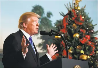  ?? Alex Brandon / Associated Press ?? President Donald Trump speaks in the Diplomatic Reception Room of the White House Wednesday in Washington. Trump recognized Jerusalem as Israel's capital despite intense Arab, Muslim and European opposition to a move that would upend decades of U.S....